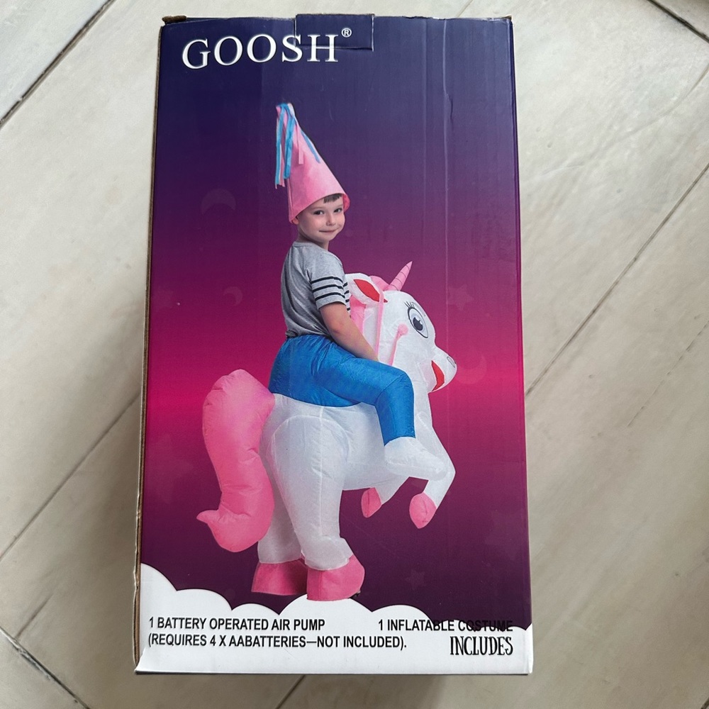 Inflatable ride on white Unicorn costume.